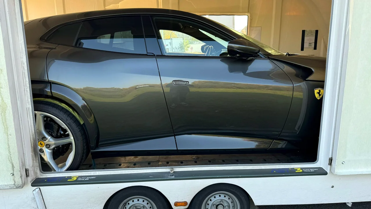 Ferrari Purosangue in an enclosed car trailer